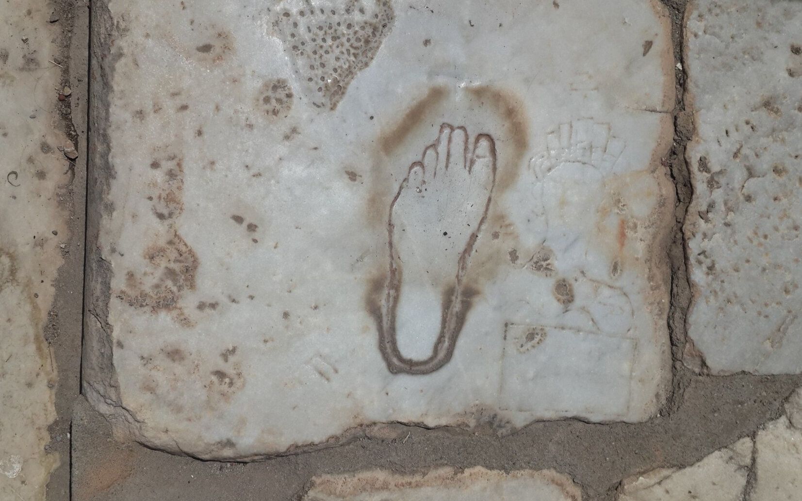 Foot carving on the marble slab near Brothel of Ephesus