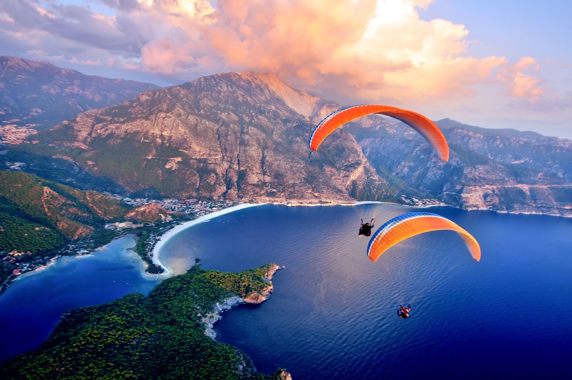 Paragliding into the sunset over Ölüdeniz in Fethiye should be on every adventurer's bucket list. (iStock)