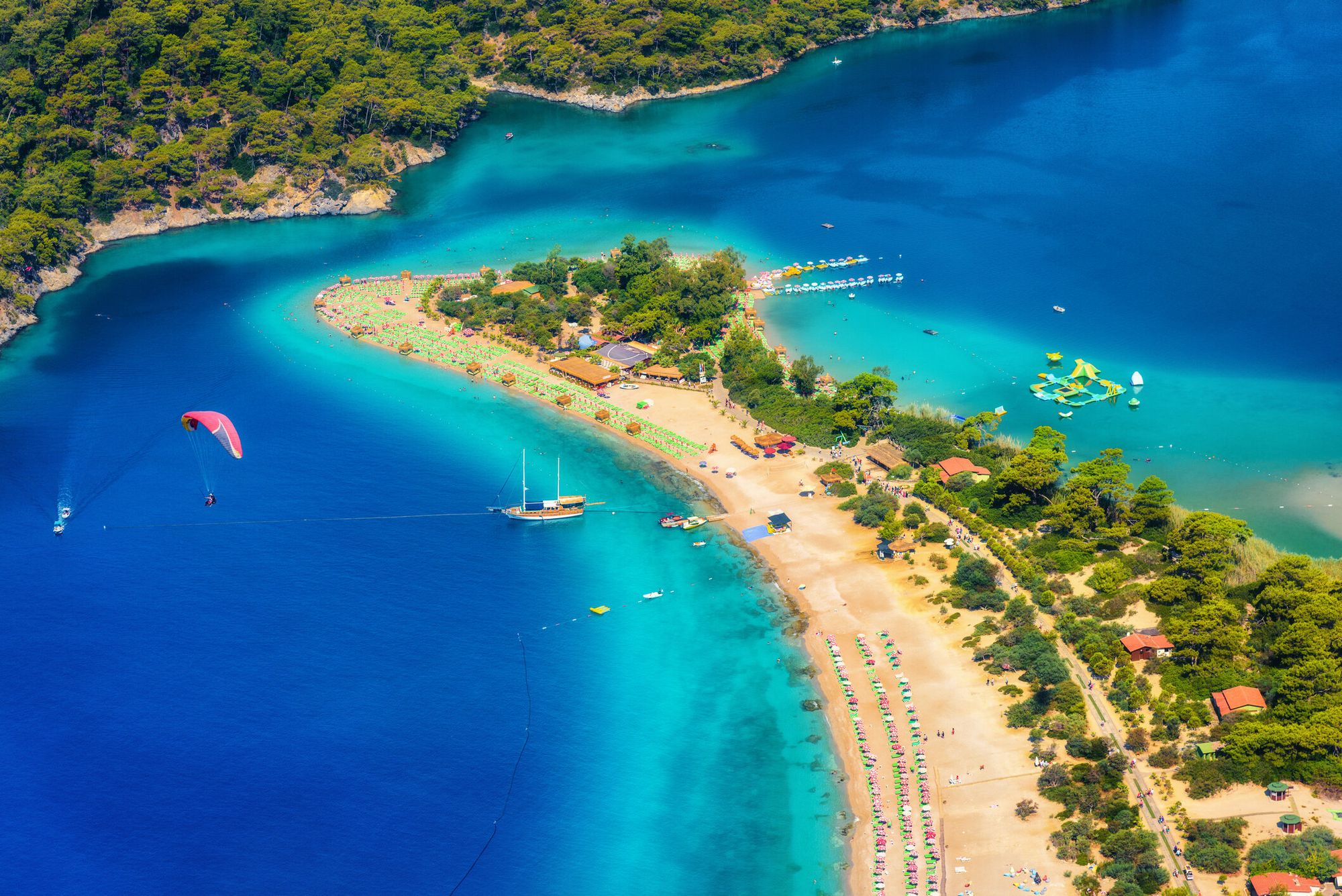 Amazing Aerial View of Blue Lagoon in Oludeniz, Turkey. Summer Landscape with Sea Spit, Green Trees, Azure Water, Sandy Beach in Bright Sunny Day. — Getty Images