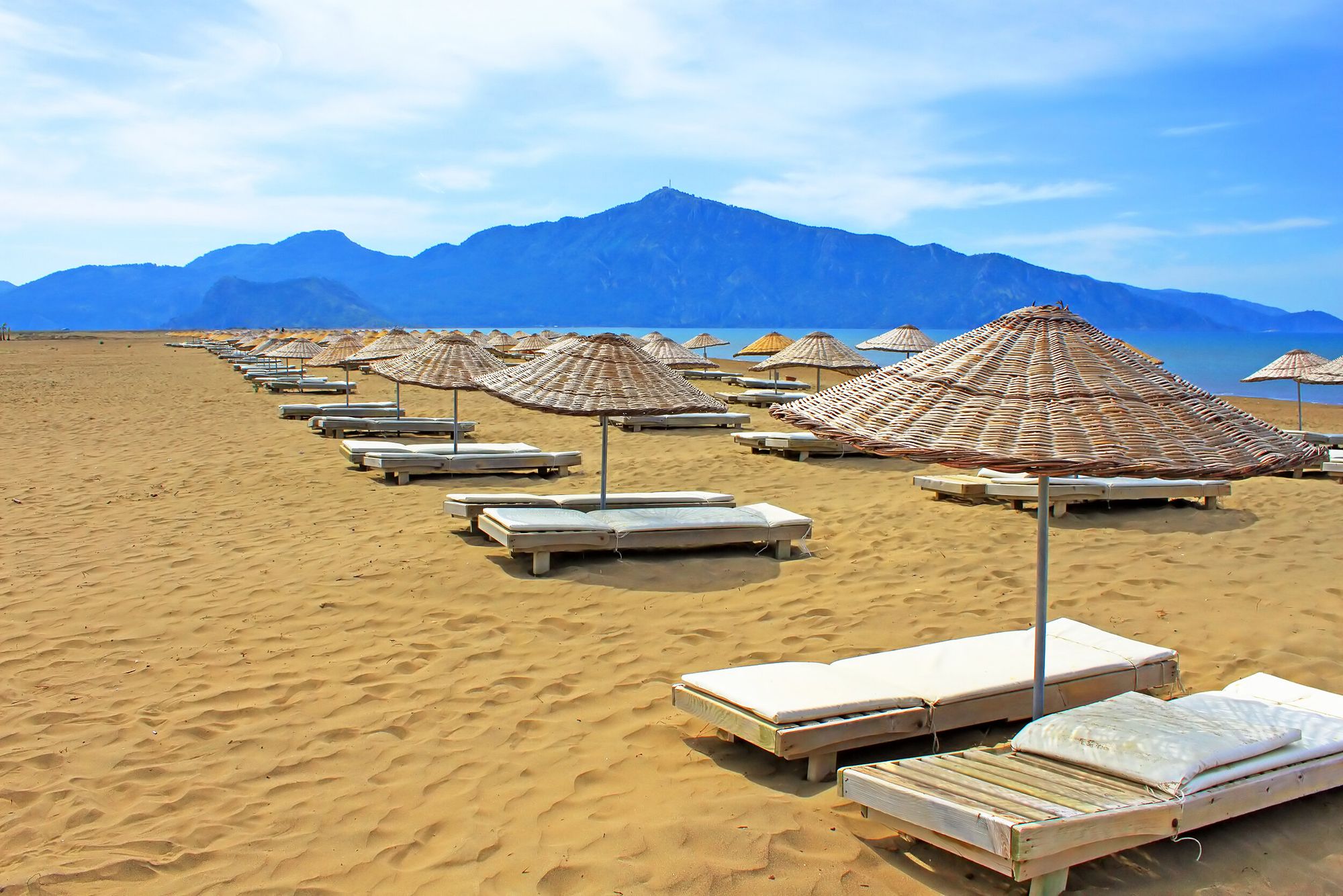 Sun Loungers on a Famous Iztuzu Beach in Dalyan, Mugla, Turkey — Getty Images