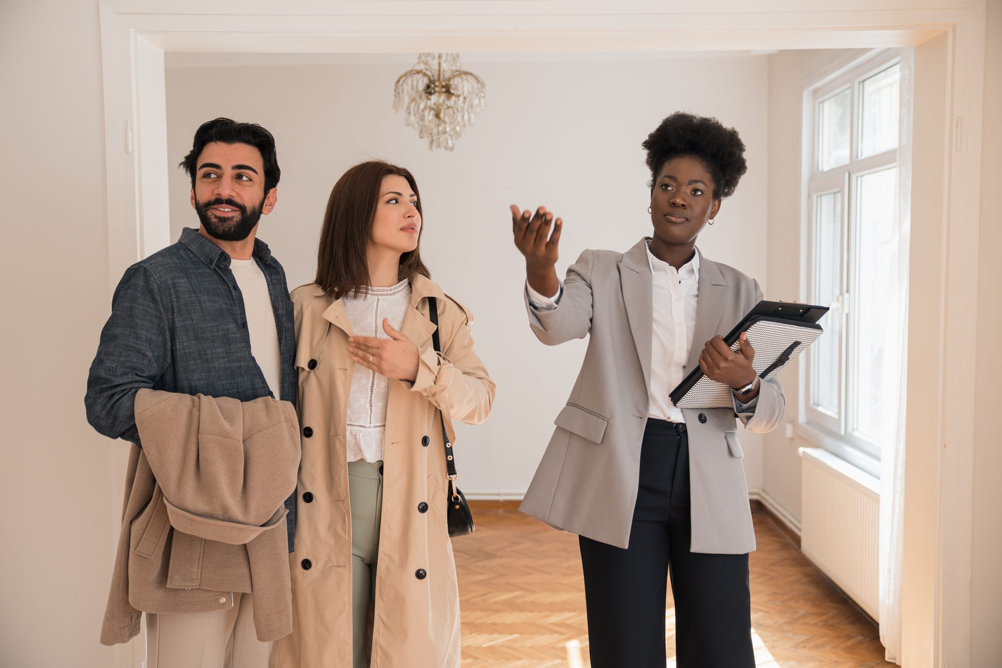 couple with a real estate agent